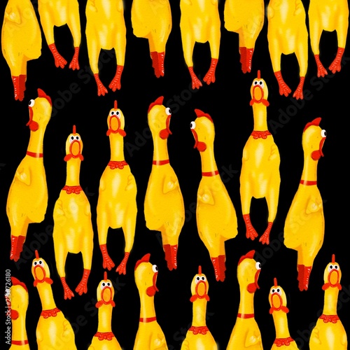 Photography seamless pattern of red and yellow plastic toys Yellow rubber chicken with a squ