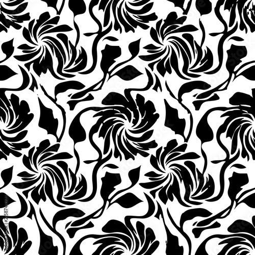 Dynamic floral seamless pattern with swirling black flower silhouettes and organic vine shapes on a white background surface
