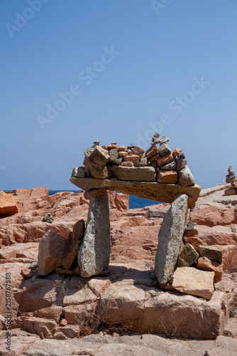 Balanced Stone Sculpture on Sardinia’s Rocky Coast