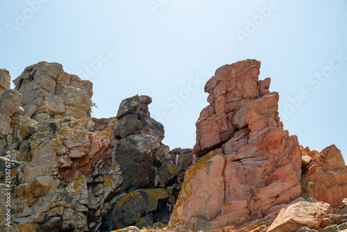 Balanced Stone Sculpture on Sardinia’s Rocky Coast