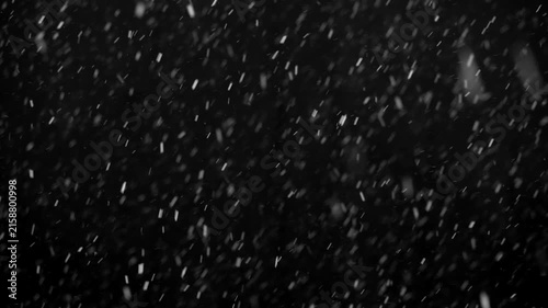 White snow isolated on black background, natural and real, winter nature, using for overlay effect
