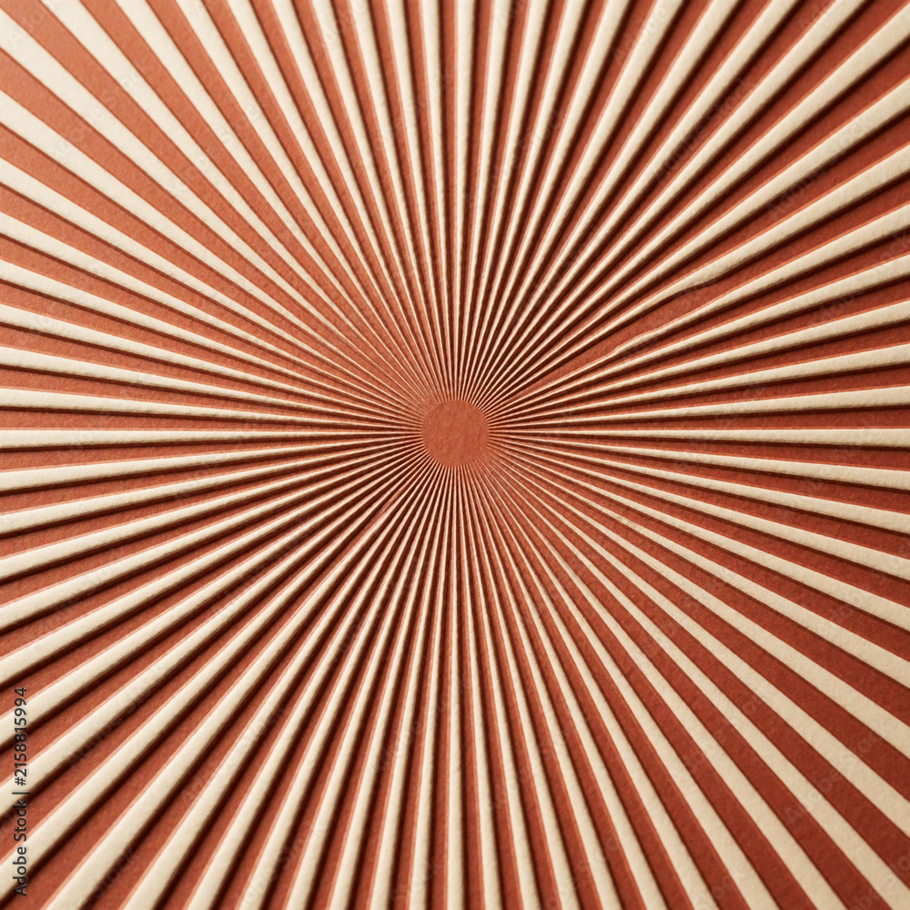 Fototapeta premium Abstract radial background with terracotta and beige paper stripes