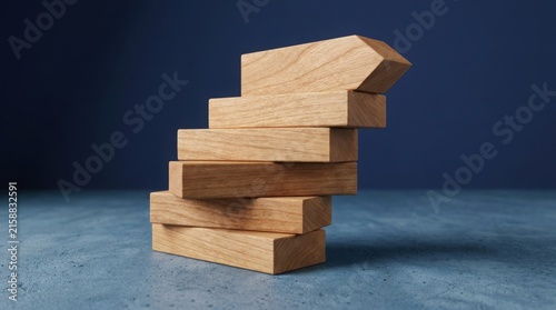 Stack of wooden blocks forming a staircase shape