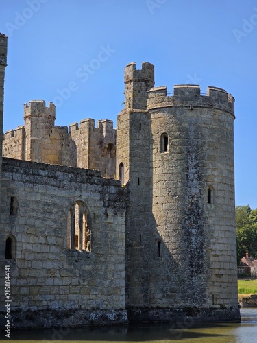 Cuadro en lienzo Stone castle tower and defensive wall with battlements, lancet windows, and turr