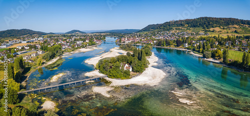Bild auf Leinwand Aerial panorama of  Islet Werd and city Stein am Rhein during the hstorical record of  low water on the Lower Rhine river due to continueous heat and drought in Summer 2026