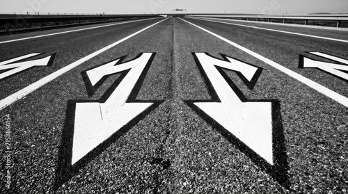 Diverse Directions On Asphalt Highway With Clear Road Markings