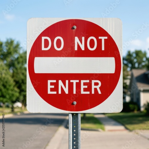 Do Not Enter Street Sign Against Suburban Neighborhood Background Warning Symbol