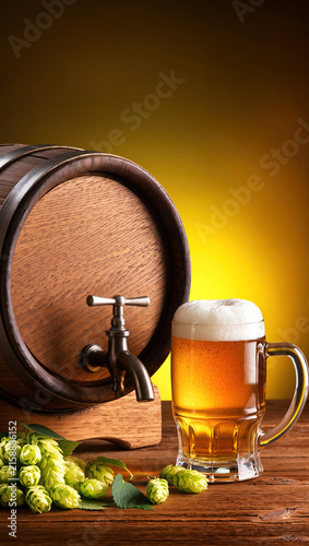 A wooden beer barrel with a brass tap, fresh beer in a glass, and green hops on a rustic table. Perfect for brewery ads, pub menus, Oktoberfest posters, drink promotions, and food packaging design.