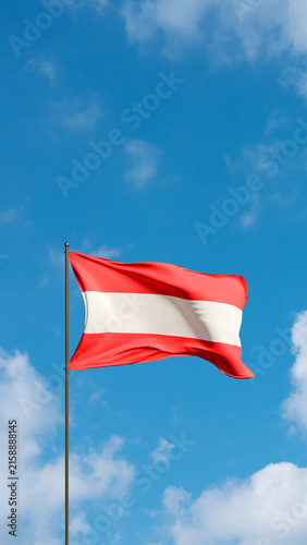 Fotografie Flag of Austria against cloudy sky