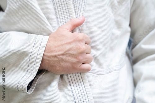 Foto White kimono traditional martial art background, copy space, jiujitsu, todo, cas
