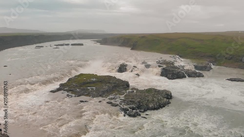 Drone view of Urridafoss waterfall and Icelandic landscape.