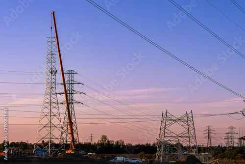 Power Transmission Network Construction at Sunset