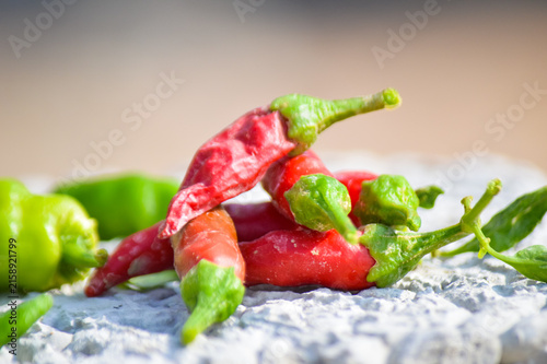 close up of organic red chili peppers healthy food