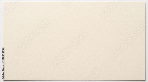 Blank off white cream colored textured paper card background.