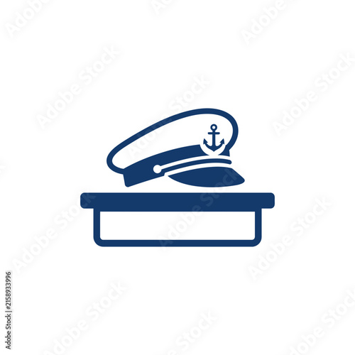 Bild auf Leinwand A dark blue icon of a nautical captain hat on a shelf
