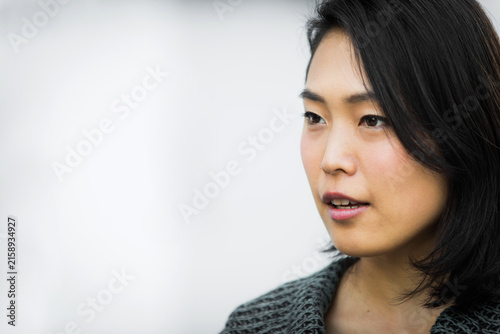 Bild auf Leinwand Portrait of beautiful middle-aged japanese woman outdoors