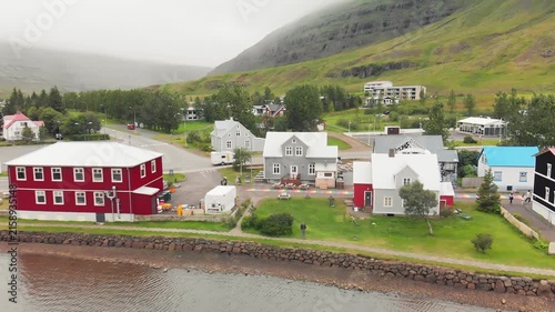 Summer aerial view of Seydisfjordur waterfront and valley.