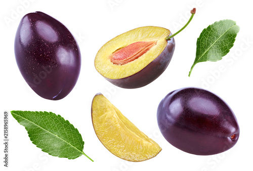 fresh plum fruit with green leaf and cut plum slices isolated on white background. clipping path