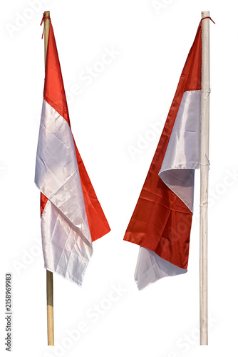 The Indonesian Red and White flag on a bamboo pole, Indonesian national flag waving against a white background.