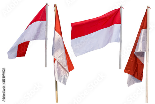 The Indonesian Red and White flag on a bamboo pole, Indonesian national flag waving against a white background.