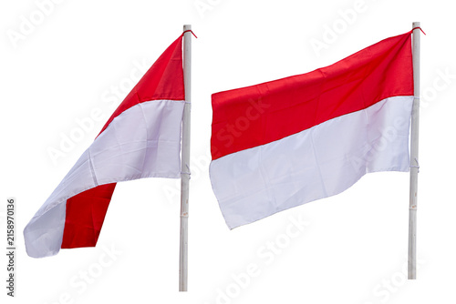 The Indonesian Red and White flag on a bamboo pole, Indonesian national flag waving against a white background.