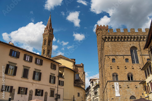 The bell tower of Badia Fiorentina and museo nazionale del bargello in Florence italy