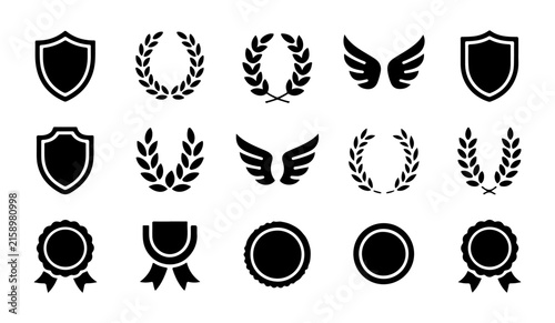 Black and white award symbols vector icon set including shields, laurels, and ribbons for victory and honor.