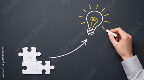 Businessman drawing a concept for innovation and solutions