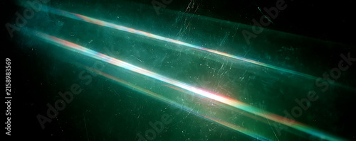 Cinematic green anamorphic lens flare light leak background