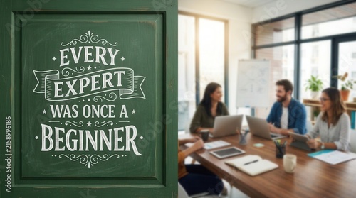Motivational Quote on Green Chalkboard with Business Meeting Team in Modern Office Conference Room
