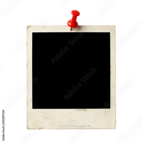 Old vintage polaroid photo frame with a red pin