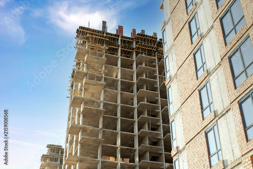 Modern Residential Building Under Construction With Brick Facade
