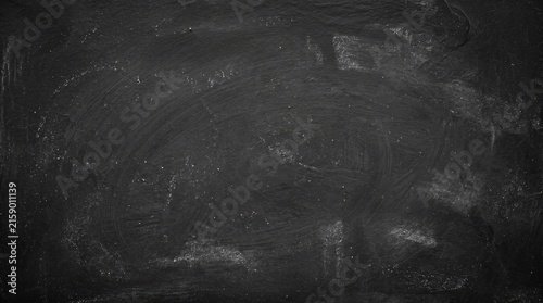 Dark textured background with chalk dust marks