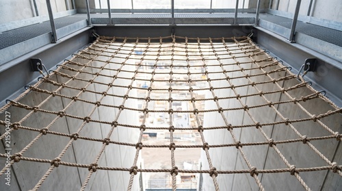 Safety Net: a Taut Knotted Rope Net Rigged Across an Open Industrial Space