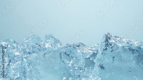 Minimal luxury ice branding background, translucent sculptural ice surface with delicate internal bubbles and crystalline textures, cool pale blue