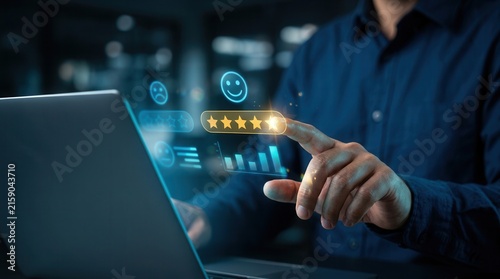Close up of a hand touching glowing digital star rating icons and customer feedback icons on a laptop.