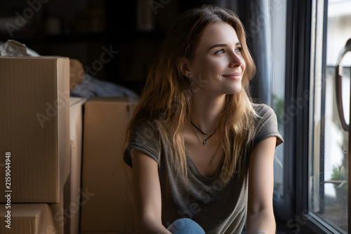 Young Adult Moving Boxes Into Tiny First Apartment Feeling Tired Yet Happy
