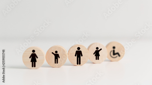 Bild auf Leinwand Inclusive community concept featuring diverse people and accessibility symbols on wooden blocks, representing equality, inclusion, disability awareness, social diversity, support and belonging