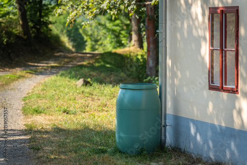 Rain Barrel for Rainwater Collection, Storage, and Reuse, Saving Water for Garden Irrigation