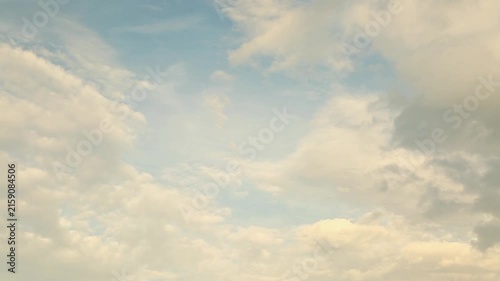 Blue sky with clouds in sunset orange colour sun rays light. Timelapse natural colors video, High quality