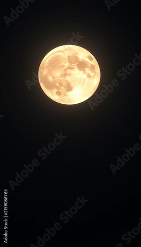 A full moon rising high in the night sky, shining bright and silver, shining, ||moon
