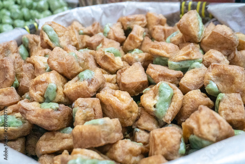 Tahu Bakso is a traditional Indonesian battered and fried tofu snack filled with meatball paste, known for its crispy, golden exterior and a soft, springy interior. 
