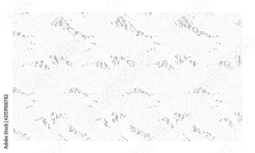 Abstract monochrome halftone pattern with scattered black dot textures on white background
