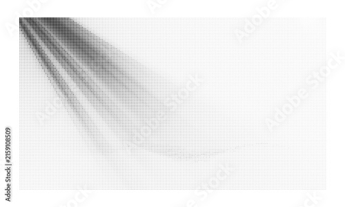 Abstract monochrome halftone pattern with varying dot density and diagonal light ray effect for modern graphic design backgrounds