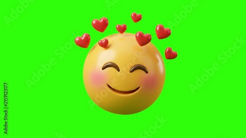 A glossy yellow 3D smiling emoji face with rosy blushing cheeks and floating red hearts overhead on a chroma key green background. Perfect for romantic social media posts, Valentine's Day content, lov