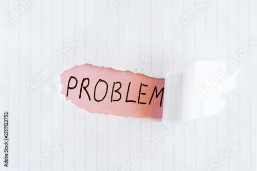 Obraz na płótnie Problem Handwritten Message Revealed Through Torn Paper, Challenge and Issue Con