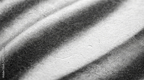 Abstract halftone texture with monochrome ink gradient for modern design backgrounds