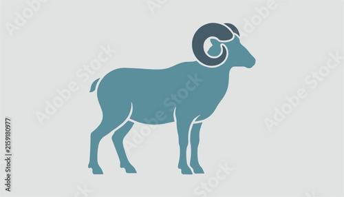 Majestic mountain ram silhouette with large curled horns standing in side profile view on clean light grey backdrop.