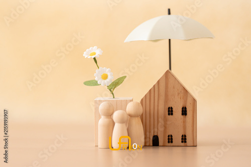 Принти на полотні Home insurance concept with family and house protected by glowing umbrella, symbolizing property protection, financial security, safety, coverage, insurance