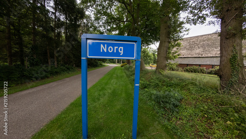 Blue city limit entry sign 